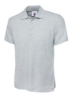 Light gray short-sleeve polo shirt with a three-button placket, collar, and relaxed fit.