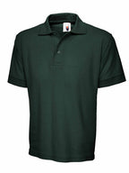 Dark forest green short-sleeve polo shirt with a classic collar, three-button placket, and a regular, relaxed fit.