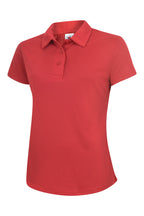 Women’s short-sleeve red polo shirt in textured performance fabric with a three-button placket and fitted silhouette.