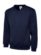 Navy blue v-neck sweatshirt with long sleeves, ribbed cuffs, and hem in a relaxed fit.
