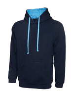 Navy blue pullover hoodie with light blue hood lining, matching drawstring, and front kangaroo pocket. Regular fit.