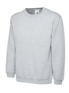 Heather grey long-sleeve crewneck sweatshirt with ribbed cuffs and hem in a relaxed, classic fit.