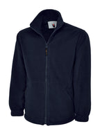 Navy blue full-zip fleece jacket with a mock neck, side pockets, and elasticized cuffs. Regular fit.