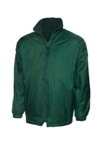 Dark green zip-up reversible jacket with a high collar, long sleeves, elastic cuffs, and a regular fit.