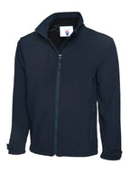 Navy blue softshell zip-up jacket with mock neck, vertical chest pocket, and adjustable velcro cuff tabs. Standard fit.