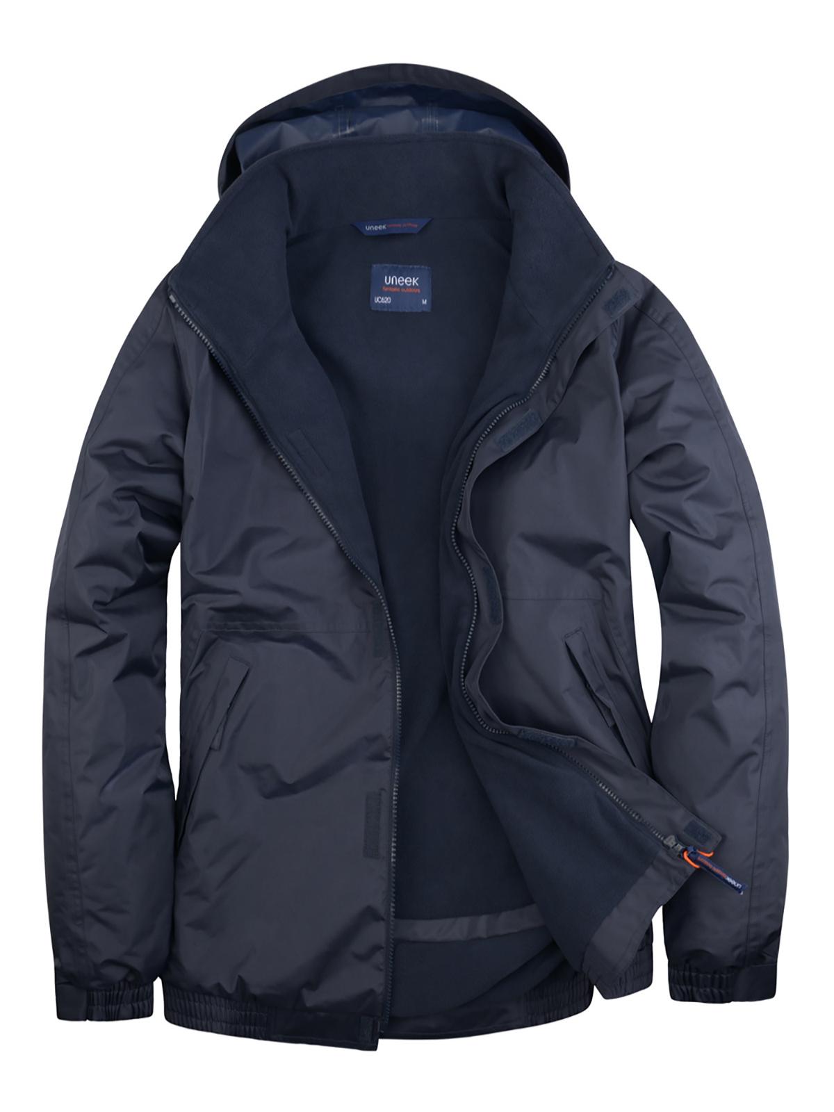 Navy blue fleece-lined waterproof jacket with hood, front zip closure, and elasticated hem. Regular fit.