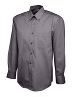 Dark gray button-up dress shirt with a button-down collar, long sleeves, and a single chest pocket. Regular fit.