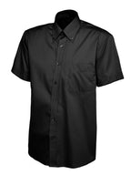 Black short-sleeve button-down shirt with a button-down collar, front chest pocket, and a classic regular fit.