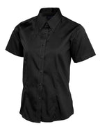 Black short-sleeve button-down shirt with a pointed collar, button-front, and tailored fit.