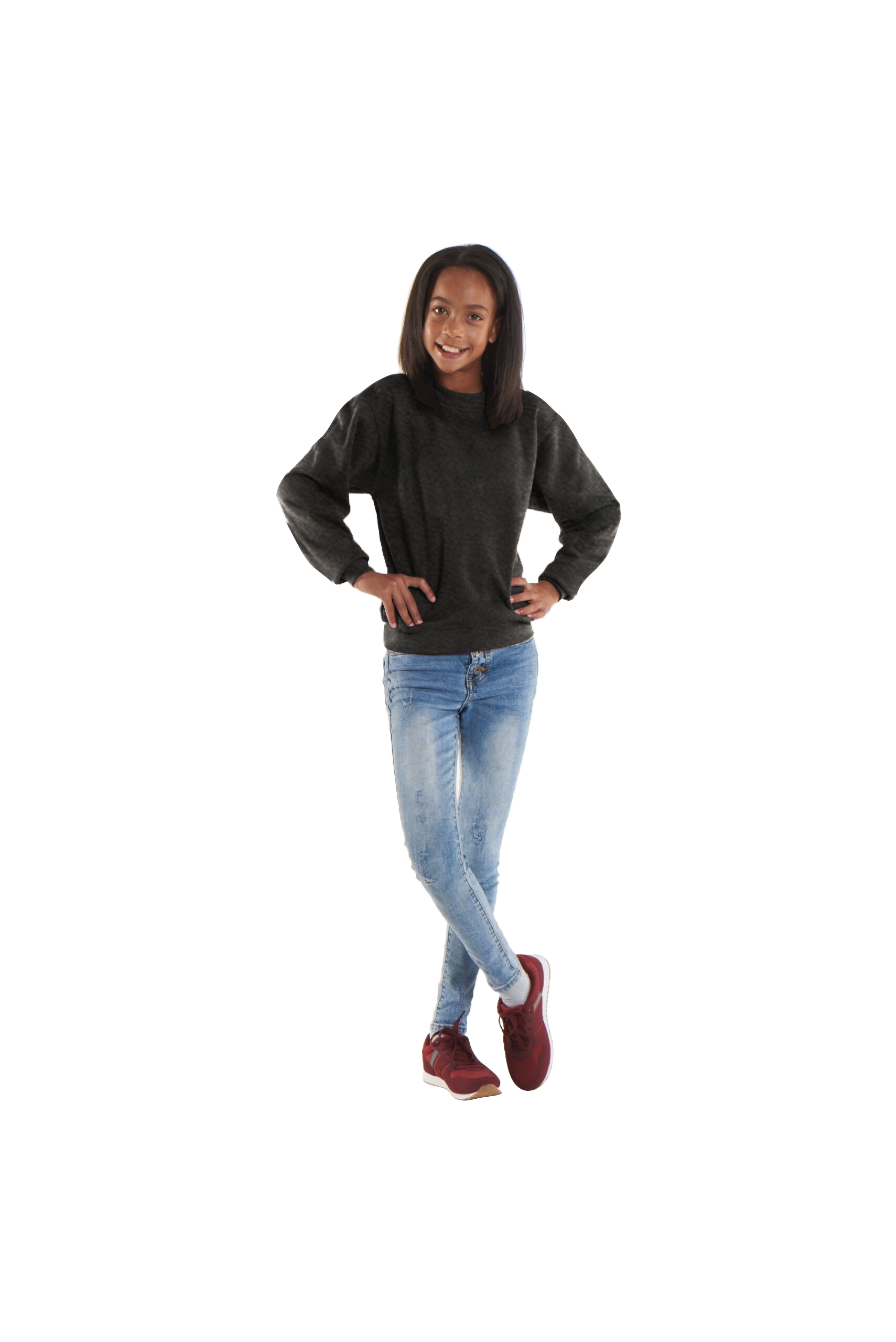 Girl wearing a relaxed-fit dark charcoal gray crewneck sweatshirt and slim-fit light blue distressed denim jeans.